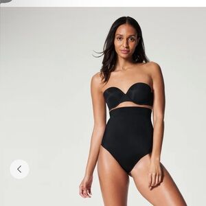 Brand new with tags black Spanx thong shapewear, high compression.